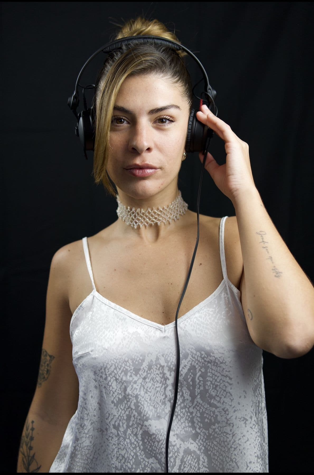Editorial portrait with headphones